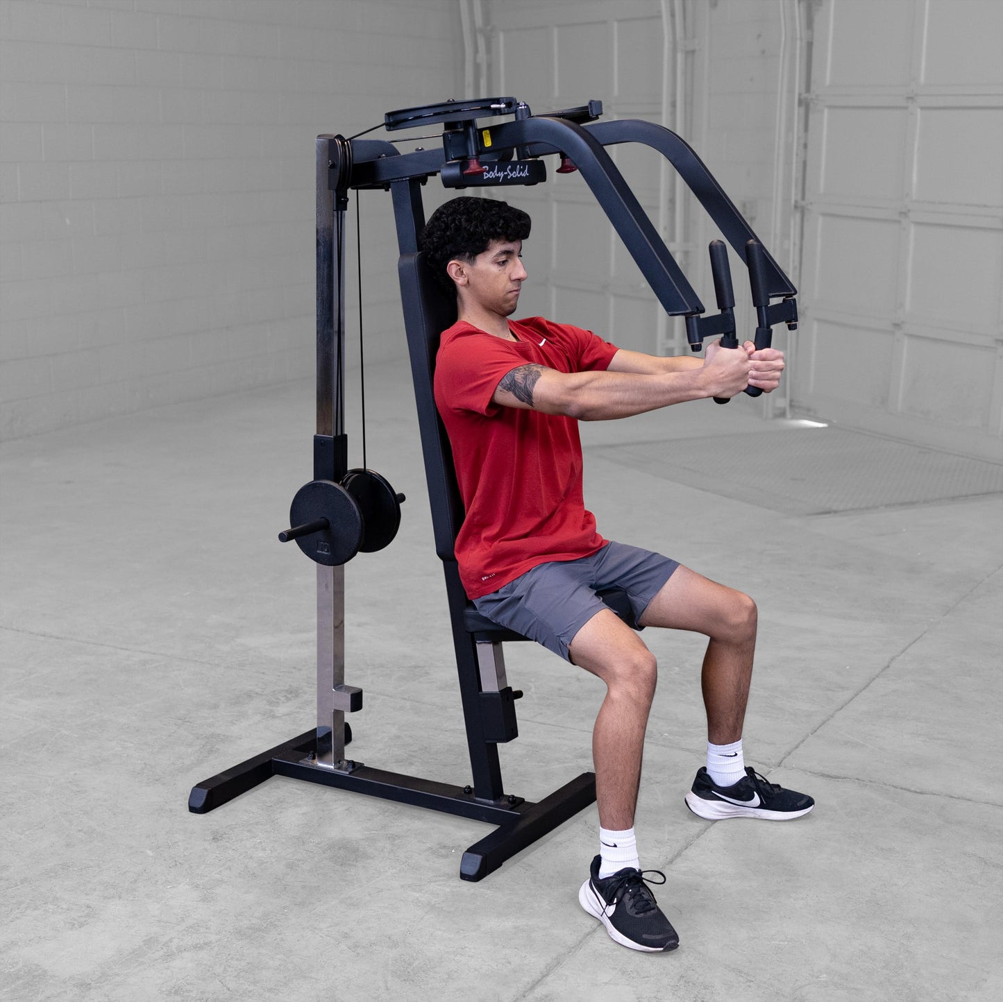 Body-Solid (GPM65B) Dual Function PEC Machine - Plate Loaded, Adjustable Chest, Back & Shoulder Workout Equipment, Black