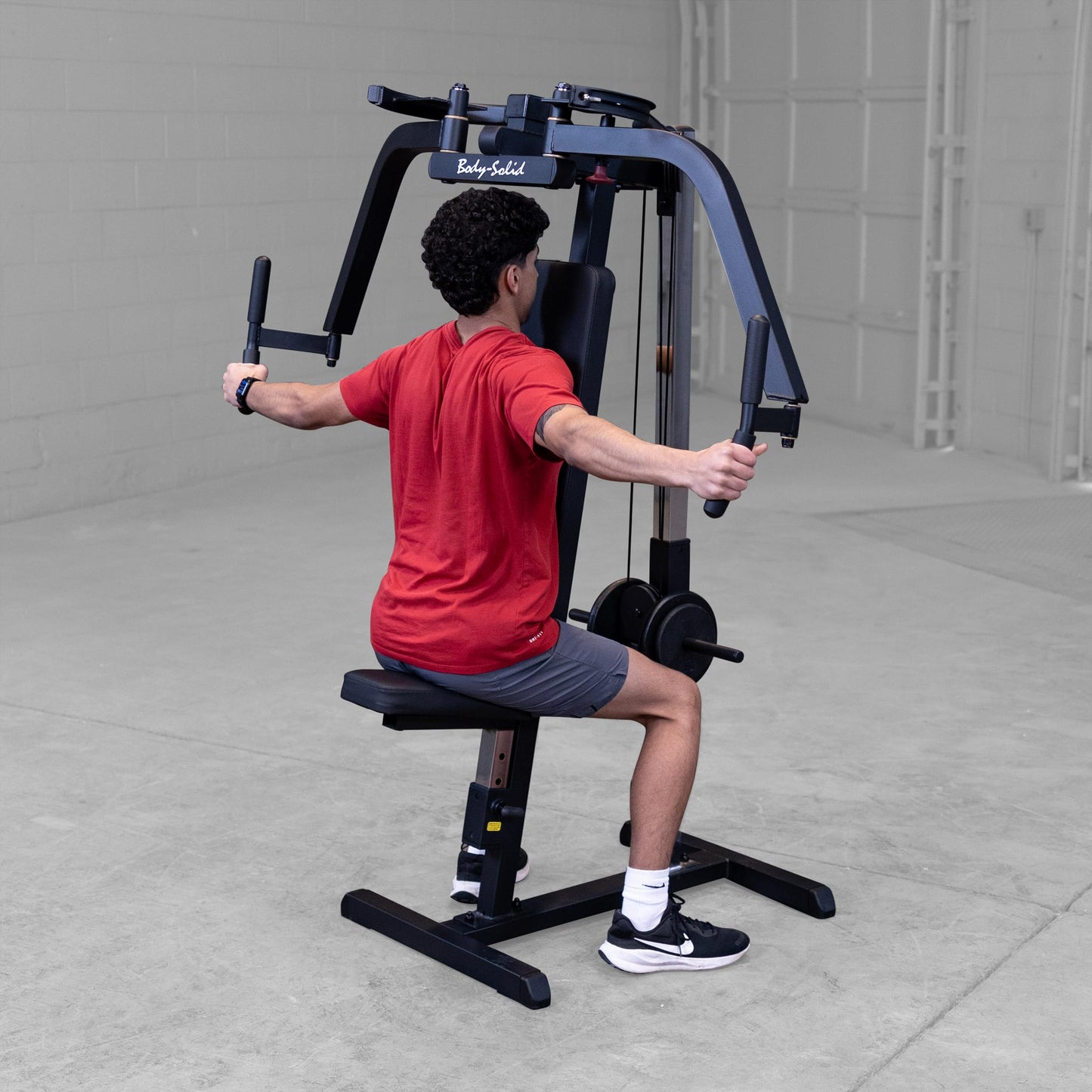Body-Solid (GPM65B) Dual Function PEC Machine - Plate Loaded, Adjustable Chest, Back & Shoulder Workout Equipment, Black
